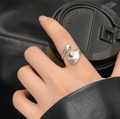 Simple geometric irregular glossy ring