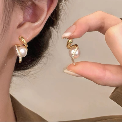 Snake-shaped pearl earrings, golden color, women's elegant style